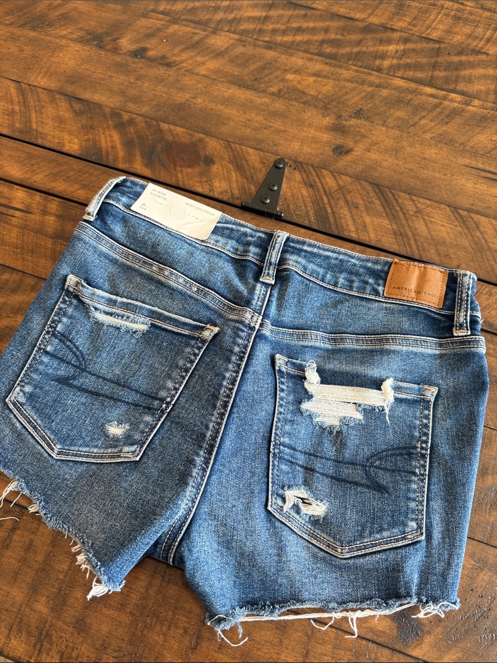 American Eagle Outfitters Blue Denim High-Rise Shorts with Floral Lining - Picture 5 of 6